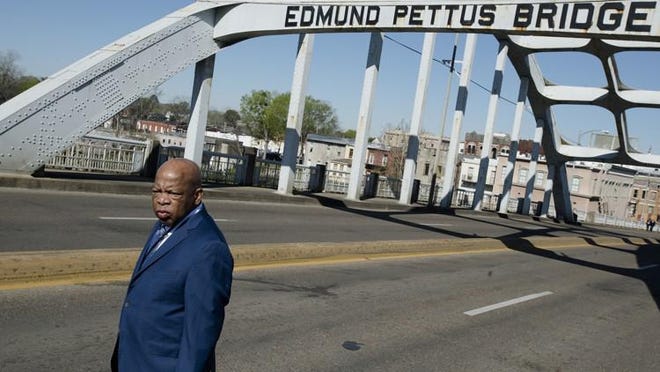 Congressman John Lewis stands on the Edmund Pettus Bridge on Sunday, March 4, 2018, in Selma, Ala., during the annual commemoration of ?Bloody Sunday,? the day in 1965 when voting rights protesters were attacked by police as they attempted to cross the Edmund Pettus Bridge.