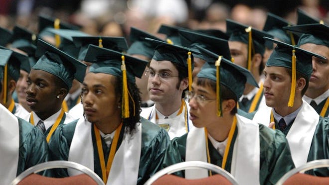 The 2004 graduation at Suncoast High School, Palm Beach County's first IB school, starting in 1989. Palm Beach Post file photo