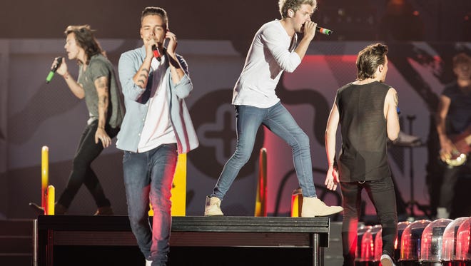 (L-R) Harry Styles, Liam Payne, Niall Horan and Louis Tomlinson of One Direction perform on stage at Century Link Field on July 15, 2015 in Seattle.