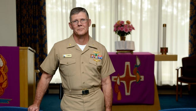 Lt. Cmdr. Jim Myers, once a Marine Corps helicopter pilot, decided to re-enlist in the military and is now a chaplain at Naval Hospital Pensacola, where he provides guidance to patients, families and staff.