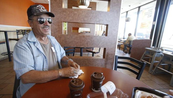 Gregory Lovato, 70, from Santa Fe, hangs out at McDonald's, talking about the old days in Santa Fe, when he was growing up.