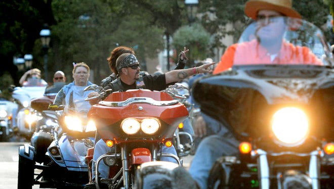 Hundreds of motorcyclists join in the York Bike Night parade along Market St. Friday, Sept. 19, 2014. York Bike Night, with attractions in and around Continental Square, is sponsored by Harley-Davidson Motor Co. and The City of York. Bill Kalina - bkalina@yorkdispatch.com