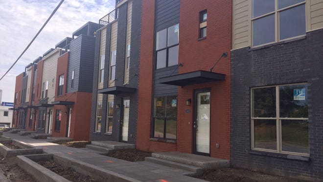 Hubbell Realty Co.'s Artisan Row townhomes on the western edge of downtown Des Moines, shown in late 2015. The 27 high-end units ranging in price from $300,000 to $350,000 sold before the project was finished.