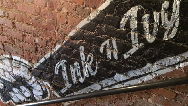 Ink N Ivy opens today at 21 E. Coffee St.