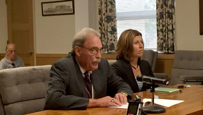 Jim Holtry, director of Lebanon County Children and Youth Services, and Adult Probation Chief Officer Sally Barry discuss the rising costs of handling county's abused children and juvenile offenders at last week's board of commissioners' meeting.