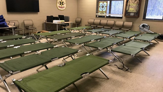 Cots set up for an overnight warming station at the Westland Fire Department.
