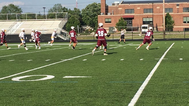 Okemos boys lacrosse fell to East Grand Rapids, 20-8, Friday night in the Division 2 state quarterfinals at Lansing Catholic High School.