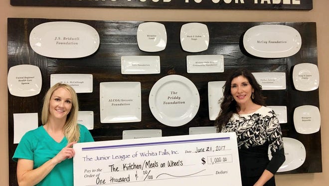 The Junior League of Wichita Falls awarded $1,000 to THE Kitchen in honor of the Salvi Family, who received the Give Light Award for Dream Team Volunteers for their service to Meals on Wheels.