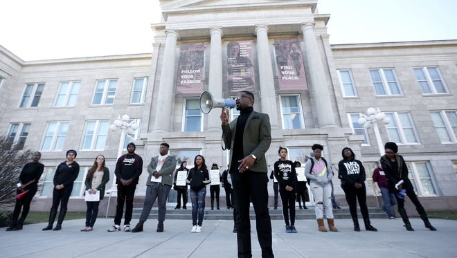 Xavier Torres-Ghoston leads chants into a megaphone calling for the removal of Juan Meraz, assistant vice president of multicultural services at Missouri State, in front of Carrington Hall on Monday, Feb. 1, 2016.
Xavier Torres-Ghoston leads chants into a megaphone calling for the removal of Juan Meraz, assistant vice president of multicultural services at Missouri State, in front of Carrington Hall on Monday, Feb. 1, 2016.
