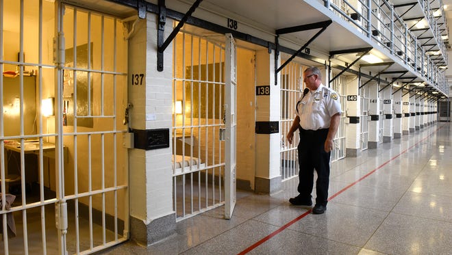 In this August 2017 file photo, Security Captain Dean Weis stands near some cells during a tour of the Minnesota Correctional Facility- St. Cloud.