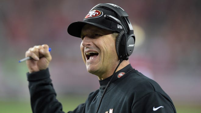 San Francisco 49ers coach Jim Harbaugh reacts against the Seattle Seahawks in the Thanksgiving game at Levi's Stadium.