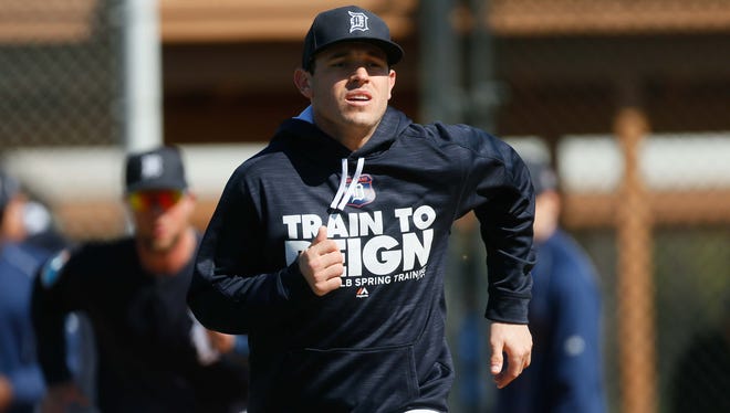 Tigers second baseman Ian Kinsler runs bases for a drill during spring training Friday in Lakeland.