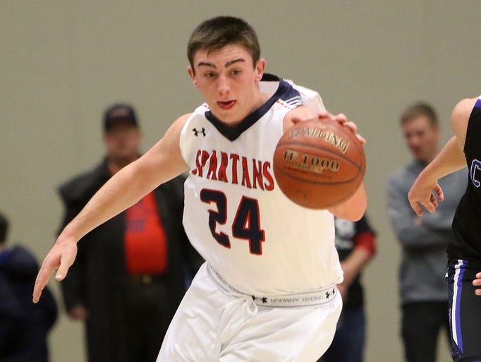 Brookfield East's Jake Graf (24) and Brookfield Central's