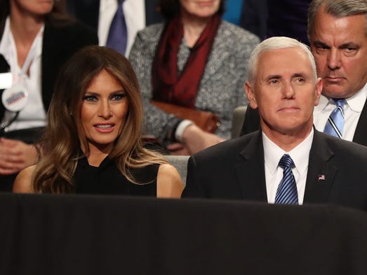Pence and Melania Trump watch the third presidential