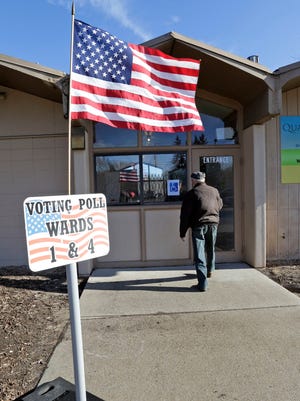 A man enters the polls at the Quarryview Center Tuesday February 21, 2017 in Sheboygan.