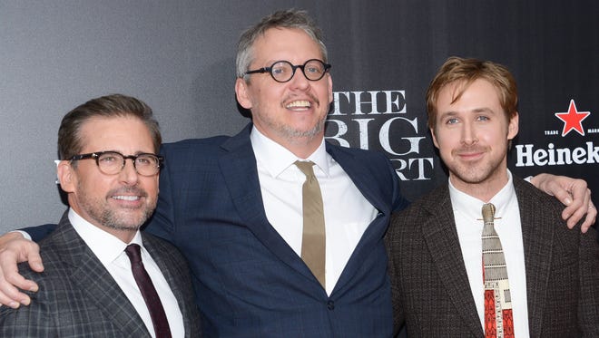 McKay is flanked by actors Steve Carell, and Ryan Gosling at the premiere of "The Big Short" at the Ziegfeld Theatre on Monday, Nov. 23, 2015, in New York. (Photo by Evan Agostini/Invision/AP)