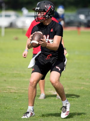 West Florida Quarterback Trevor Jordan looks for an open receiver during a seven-on-seven tournament at Ashton Brosnaham Park Friday, June 2, 2018. The seven-on-seven series gives coaches and players the opportunity to evaluate their team and judge the competition before the start of the next season.