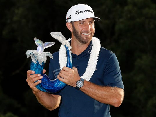 Dustin Johnson with Sentry ToC trophy