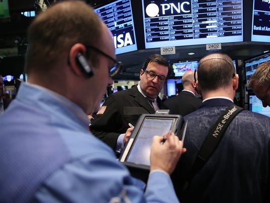 S&P 500 closes at record high; Dow comes close