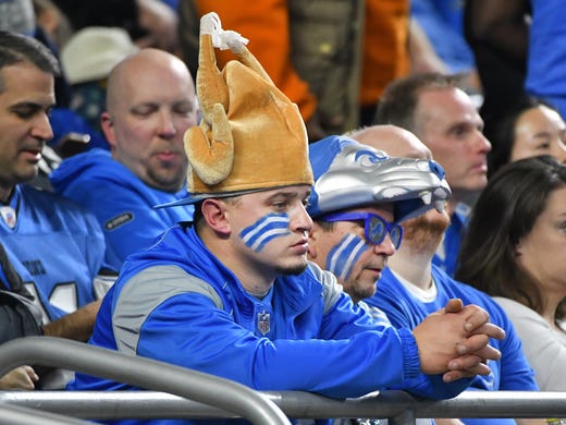 Lions fans watch as the Thanksgiving Lions game tradition