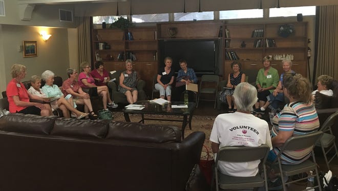 Family caregivers gather for a Duet support group meeting in July 2016.