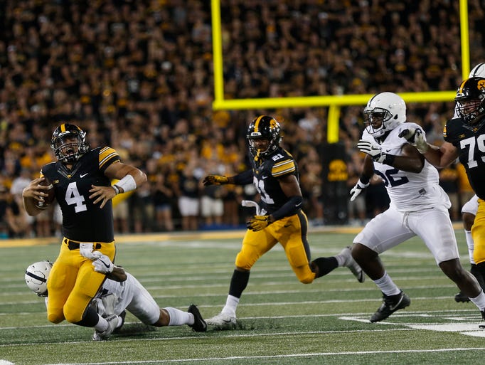 Iowa quarterback Nate Stanley gets sacked during the