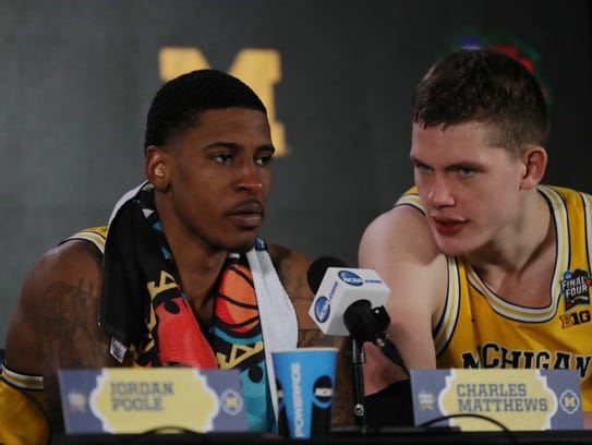 Charles Matthews, left, and Moritz Wagner speak to the media after Michigan's 69-57 victory over Loyola-Chicago in the NCAA men's  semifinal.