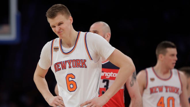 New York Knicks' Kristaps Porzingis (6) reacts to a call during Thursday's loss to the Wizards.