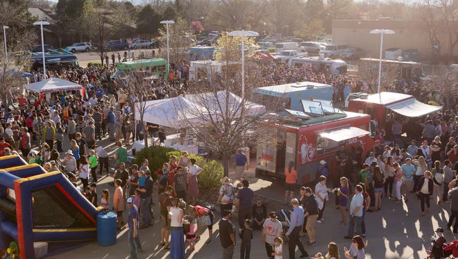 Crowds gather at a food truck festival at the Coloradoan in 2016.