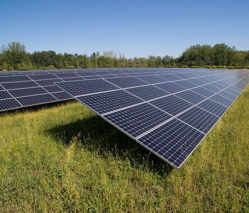 Utility-scale solar installation in a field.