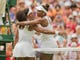 Serena and Venus hug at the net after their match on