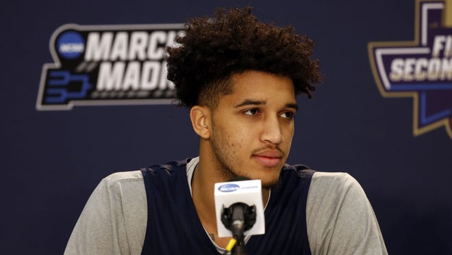 Virginia forward Isaiah Wilkins is out while suffering from "mono-like" symptoms.