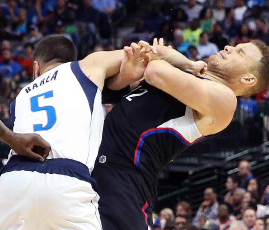 Mar 23, 2017; Dallas, TX, USA; Dallas Mavericks guard J.J. Barea (5) punches LA Clippers forward Blake Griffin (32) during the second half at American Airlines Center.  J.J. Barea (5) got ejected from the game. Mandatory Credit: Kevin Jairaj-USA TODA