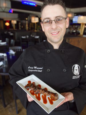 Chef Craig Myrand of the Adam Merkel Restaurants holds a plate of filet mignon tips in Diamonds Steak & Seafood restaurant in Howell Thursday, Sept. 28, 2017. Diamonds is celebrating its 34th anniversary by offering the filet mignon tips for 34 cents for 34 days.