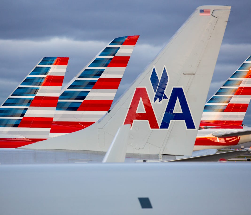 American Airlines tails line up at Terminal 3 at Chicago O'Hare International Airport on Nov. 11, 2016.