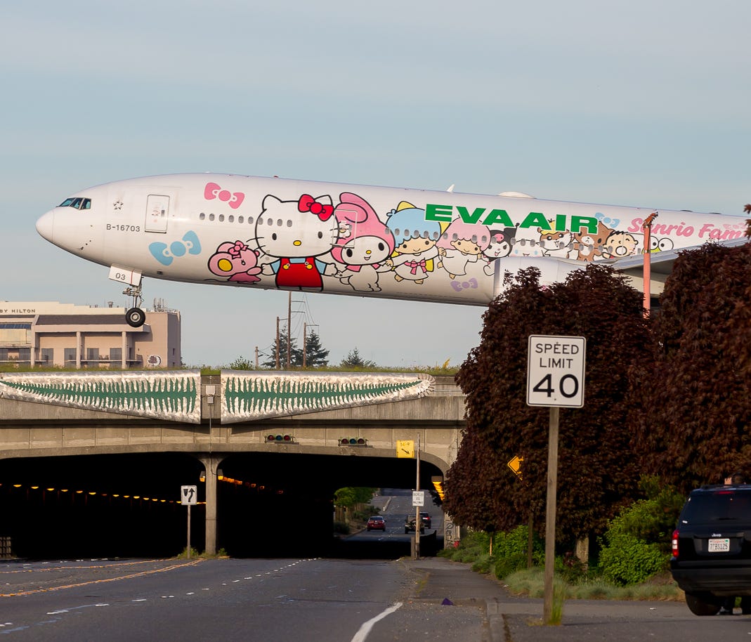 EVA Air's Hello Kitty Boeing 777 touches down at Seattle Tacoma International Airport in May 2017.