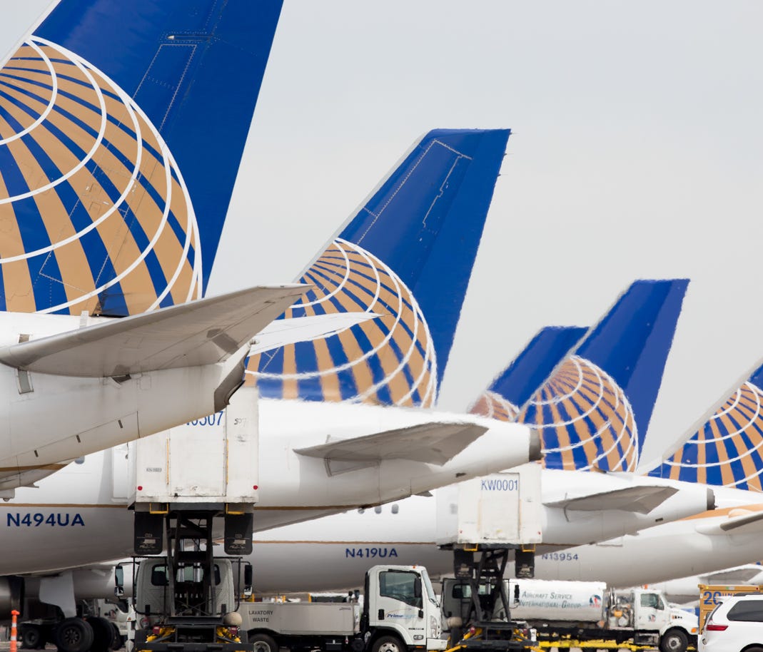 This file photo shows United Airlines planes lined up at Denver International Airport on May 7, 2017.
