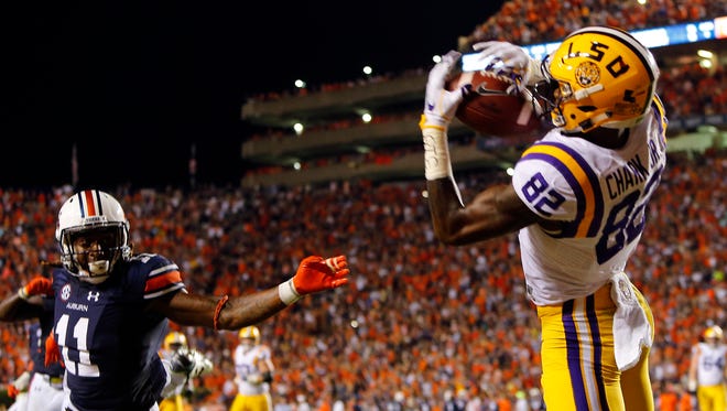 LSU wide receiver D.J. Chark (82) catches a pass for a touchdown over Auburn wide receiver Kyle Davis (11), but the play was ruled a no play as time ran out to end the game during the second half of an NCAA college football game, Saturday, Sept. 24, 2016, in Auburn, Ala. Auburn won 18-13 (AP Photo/Butch Dill)