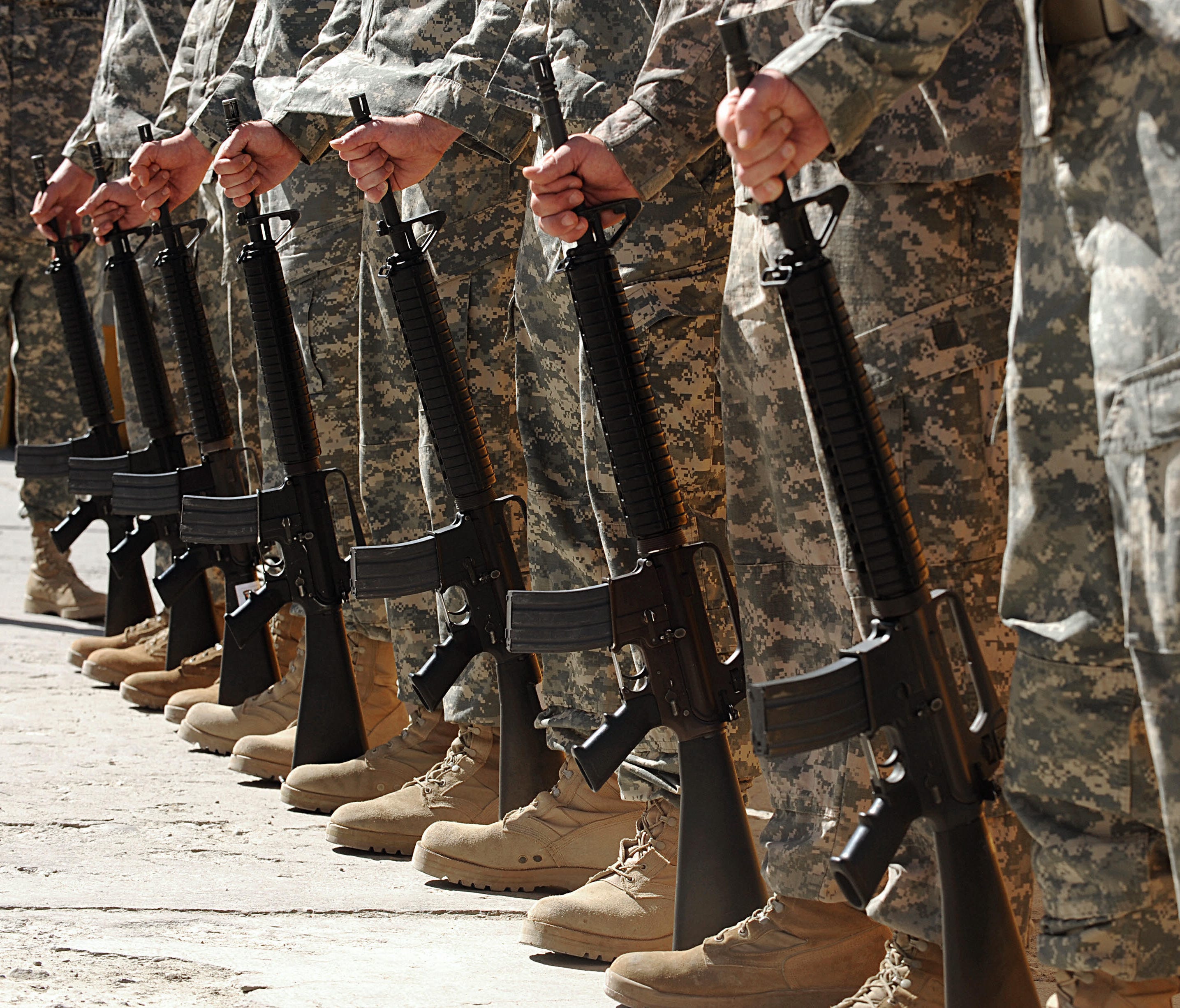 In this file photo, US soldiers stand at attention during a ceremony at Bagram air base.