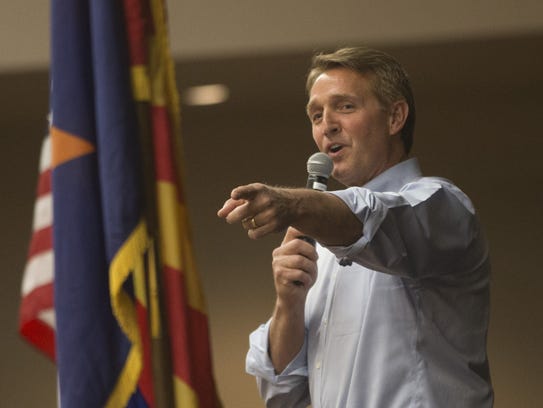 Sen. Jeff Flake addresses the audience during a town