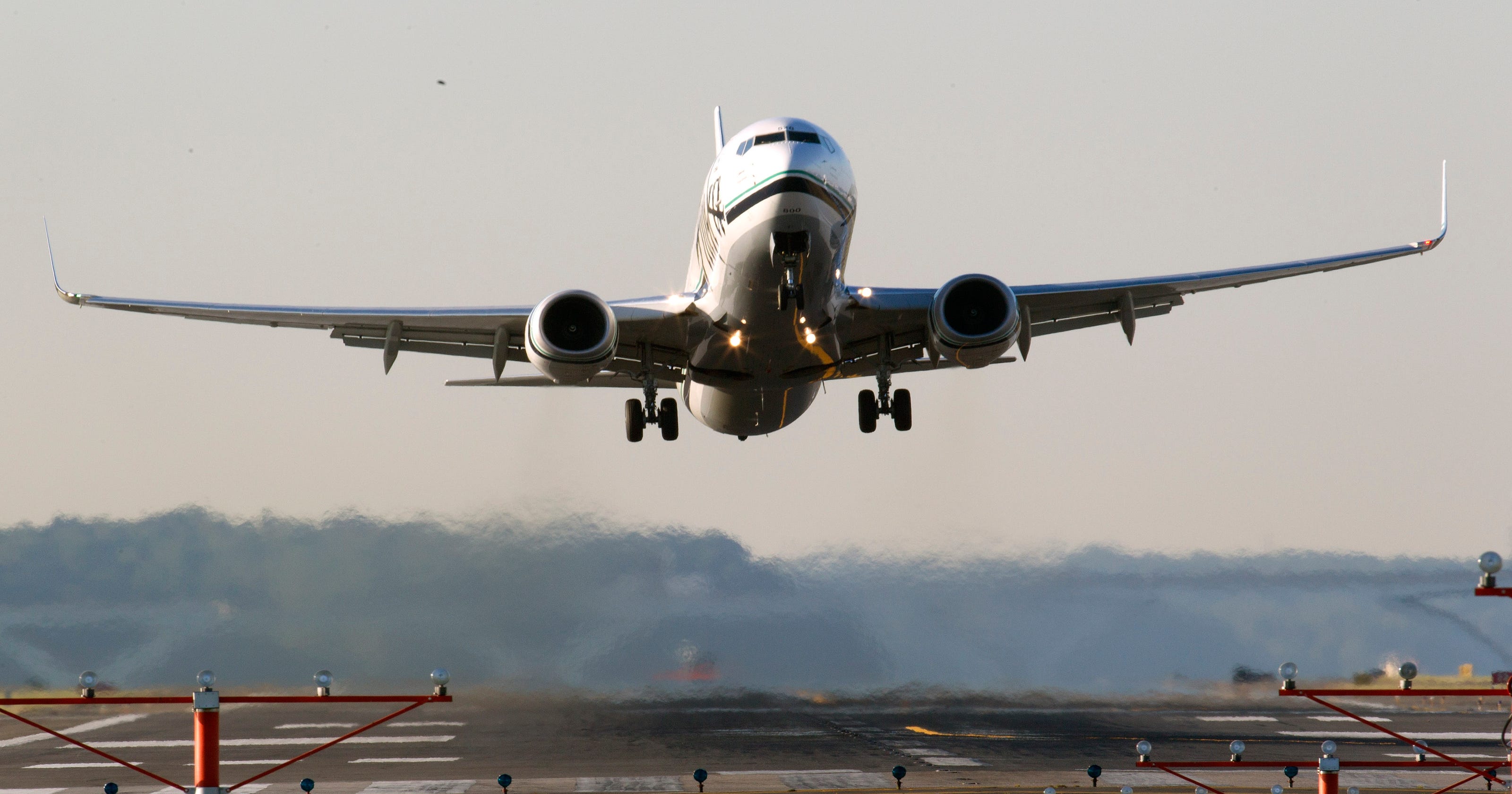 Passenger jet nearly collides with drone in midair; lasers target planes
