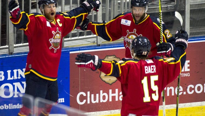 Peoria Riverman Alec Hagaman, left, celebrates his goal 14 seconds into the first period of the Rivermen 3-2 win over Pensacola Sunday, January 19, 2020 at Peoria Civic Center.