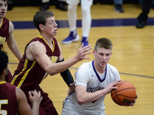 Lancaster Catholic’s Chad Wenger turns to make a pass