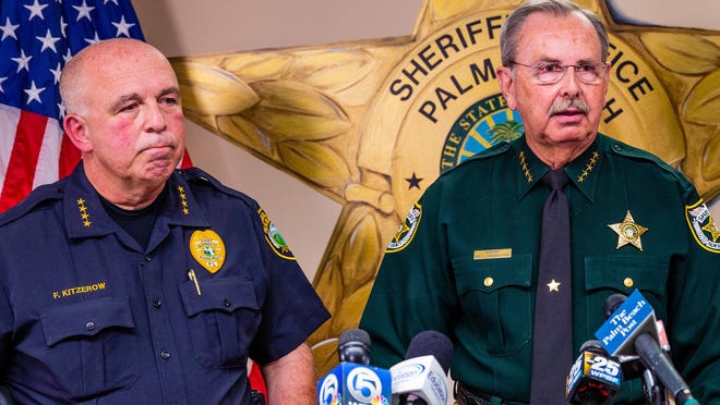 Palm Beach County Sheriff Ric Bradshaw (right) and Palm Beach Schools Police Chief Frank Kitzerow. The sheriff's office says it will provide armed 'guardian' training for people protecting charter schools.