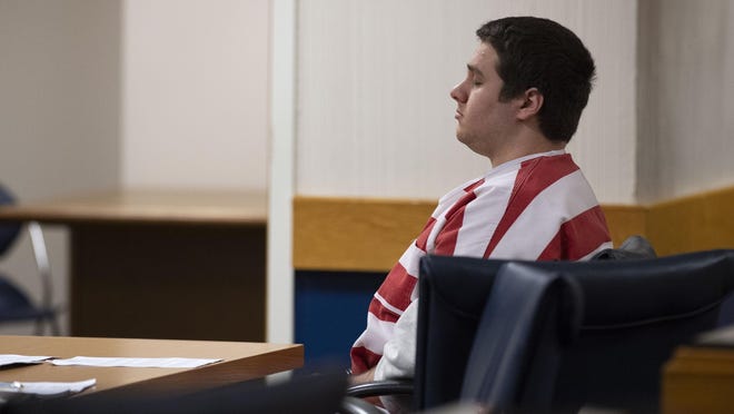 Austin Harrouff, accused of murdering a Tequesta couple in 2016, attends a status hearing in front of Martin County Circuit Judge Sherwood Bauer on Thursday, March 5, 2020, at the Martin County Courthouse in Stuart. A state-hired psychologist recently concluded Harrouff was legally insane at the time of the crime and the judge agreed to cancel the May 18 trial after state prosecutors requested to hire a second mental health expert to evaluate Harrouff. LEAH VOSS/TCPALM