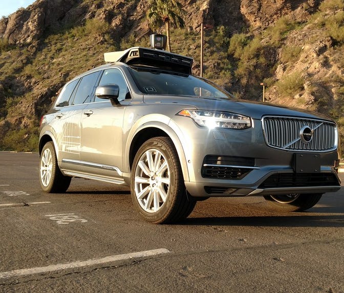 A handout photo from Uber shows one of its Volvo self-driving SUVs in a desert setting. One of the company's vehicles struck and killed a pedestrian in Tempe, Ariz., Sunday night.