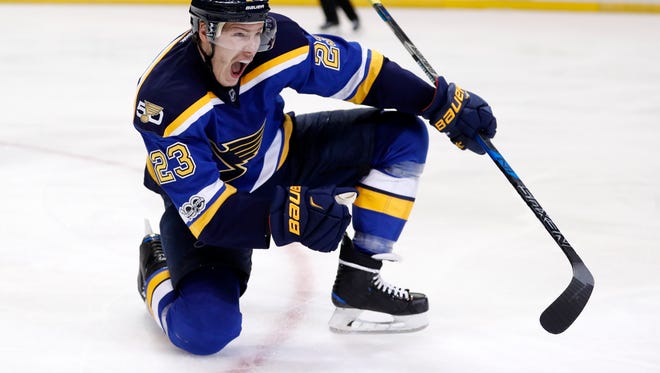 St. Louis Blues right wing Dmitrij Jaskin, of Russia, celebrates after scoring a goal against the Nashville Predators during the second period in Game 5 of an NHL hockey second-round playoff series Friday, May 5, 2017, in St. Louis. (AP Photo/Jeff Roberson)