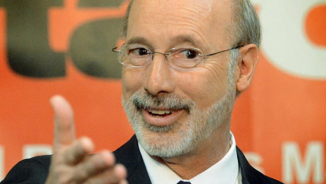 FILE - Governor Tom Wolf answers questions during a press conference at York College's J.D. Brown Center for Entrepreneurship Friday, April 10, 2015. file photo