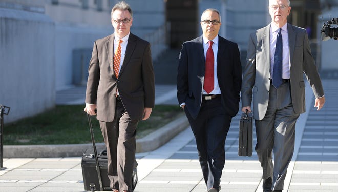 Alex Blanco, center, leaving federal court in Newark with his attorneys Aidan O'Conner and Joe Hayden on Thursday after he pleaded guilty to bribery.