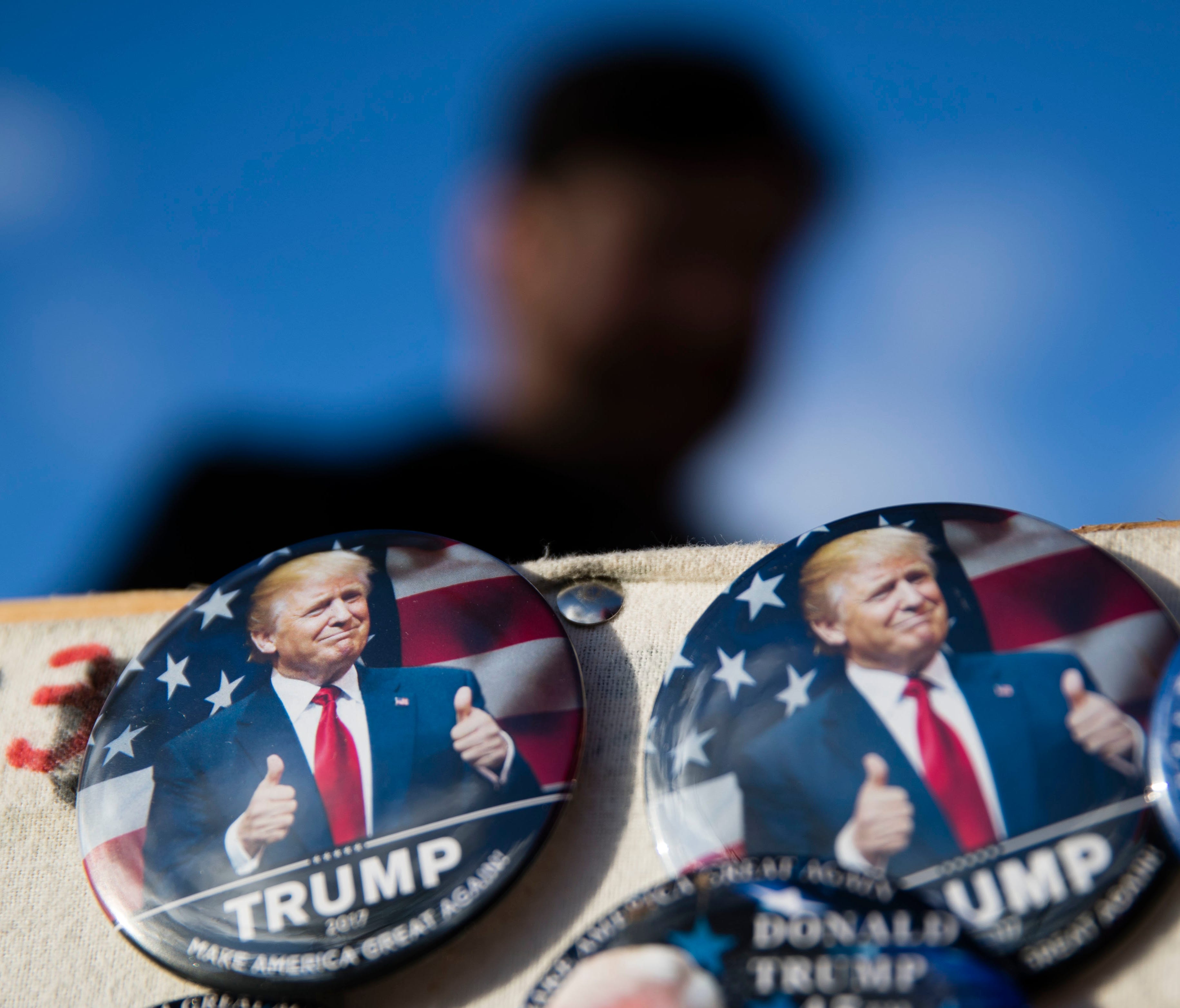 Buttons for sale are posted as preparations continue for Friday's presidential inauguration of Donald Trump in Washington D.C.
